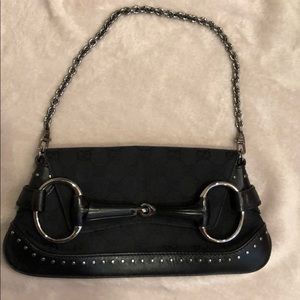 Used authentic Gucci horse bit clutch